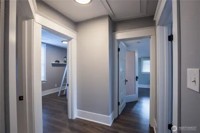 The upper floor landing leads to the 3 bedrooms and a full bathroom.