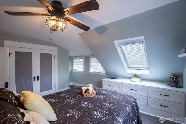 The primary bedroom is inviting and spacious.