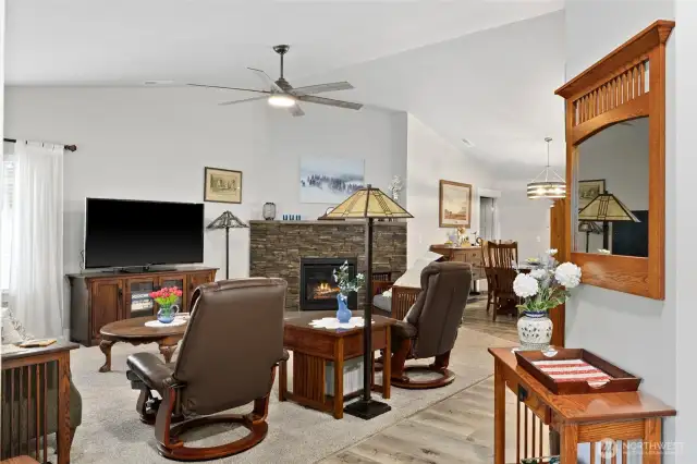 Step in to this lovely rambler with vaulted ceilings and cozy fireplace.