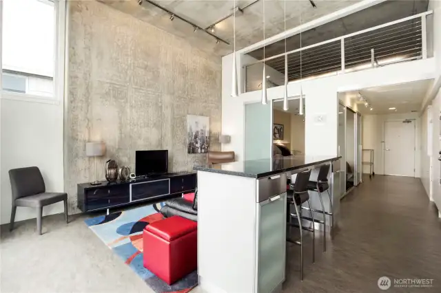 Eating space in the kitchen with loft area up above