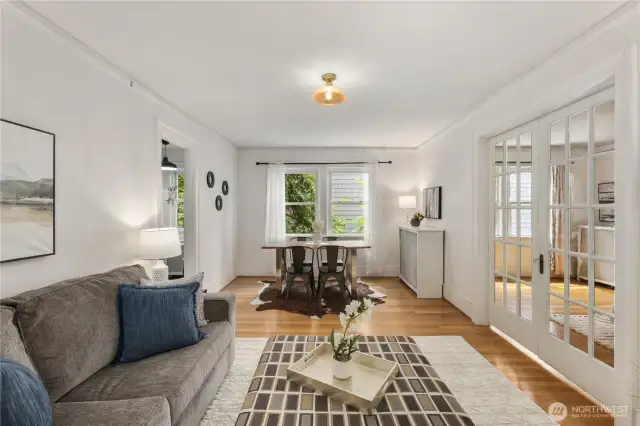French doors separate living areas and bedroom.