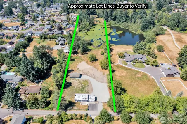 Aerial view of the approximate lot lines encompassing the home and outbuilding.