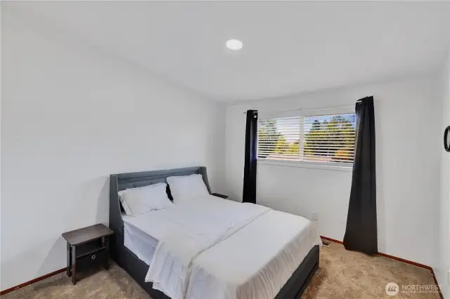 Additional Upstairs Bedroom with beautiful back yard views.
