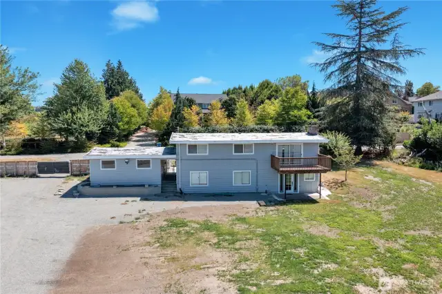 Back yard view with ample parking.