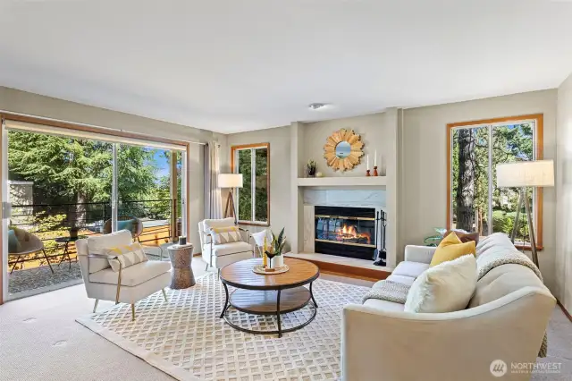 Relax around the centrally located fireplace in the large living room, or have your morning coffee on the extended balcony.