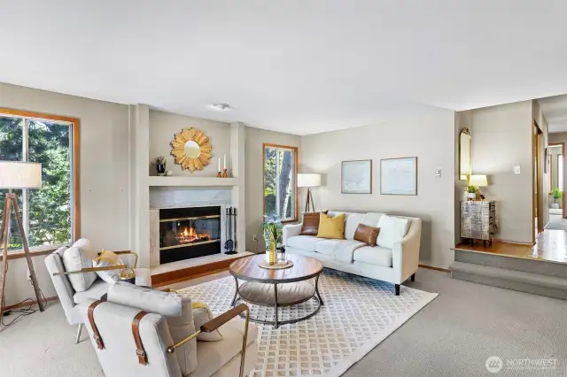 Light floods the living area and surrounded by greenery makes for a wonderful retreat.