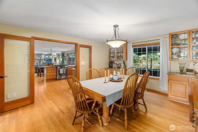 French doors separate formal spaces from main living.
