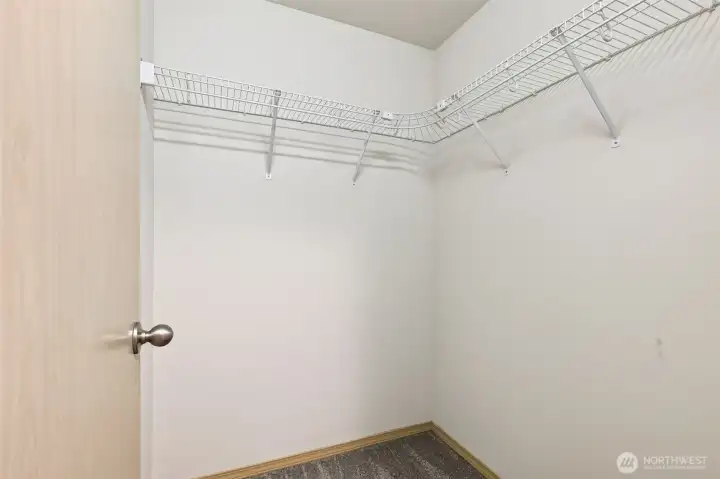 Walk in closet in Primary suite. There's also a second closet in the primary bedroom.