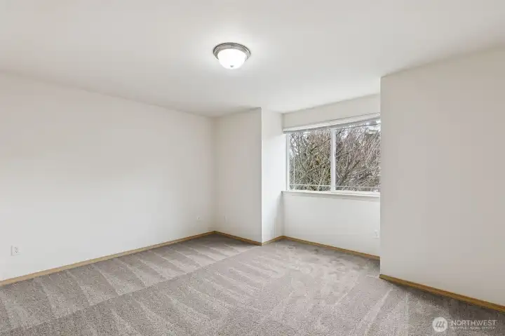 One of two additional bedrooms upstairs.