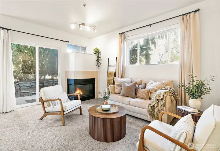 Cozy, front living room flooded with natural light