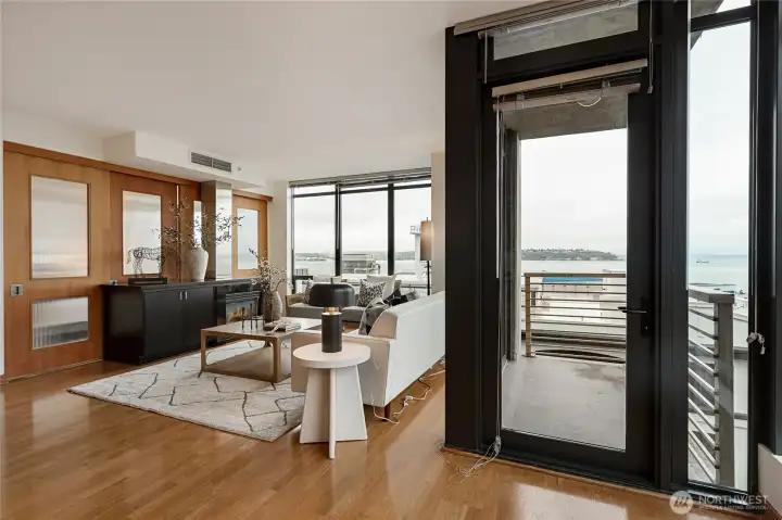 Living area with fireplace and view deck