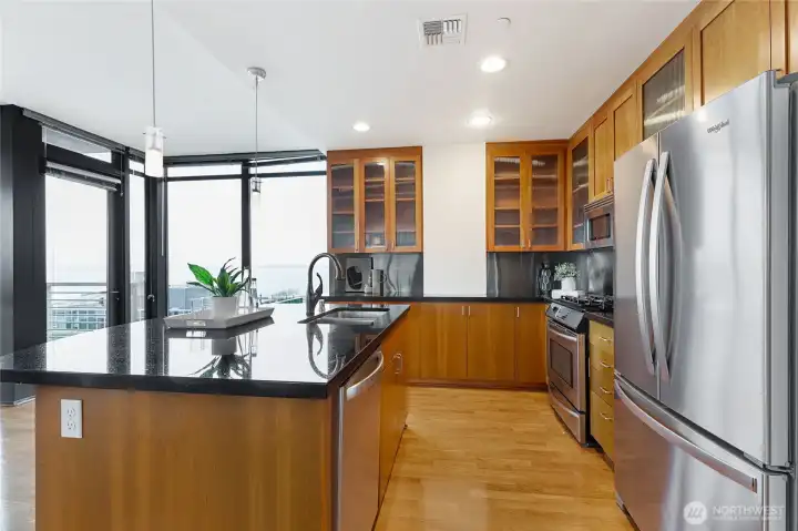 Open and spacious Kitchen with granite countertops