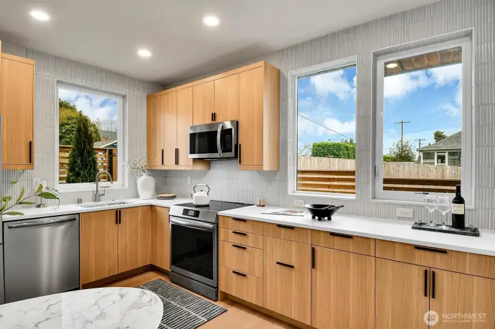 and kitchen windows provide connection between indoor