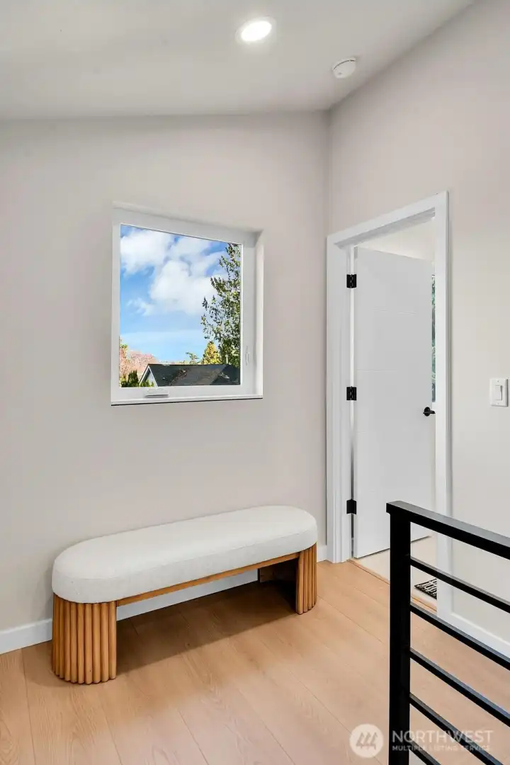 Wonderfull upstairs hall space with window towards cascade mountain view.