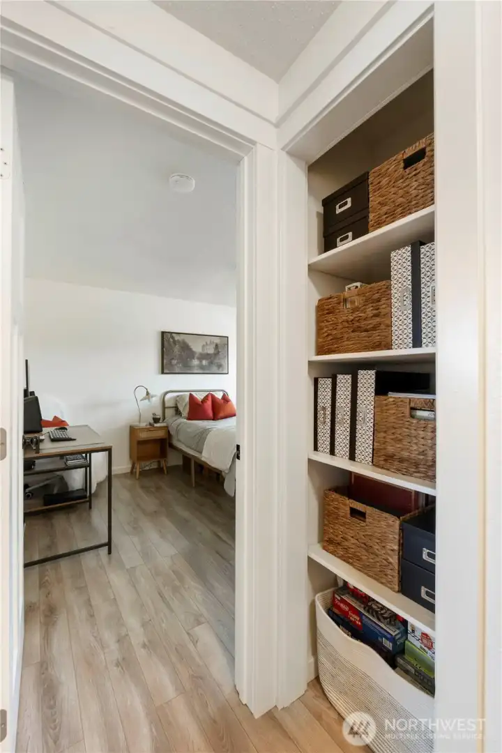 Storage in hallway between the three bedrooms