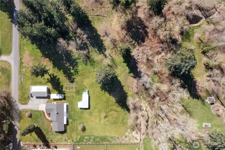 Over 2 1/2 flat acres fully fenced in.