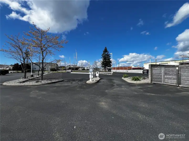 Owners parking is gated and includes 55 parking spaces each assigned to a unit owner.