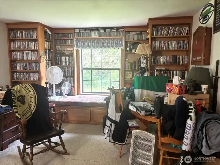 family room/den with built in maple cabinets