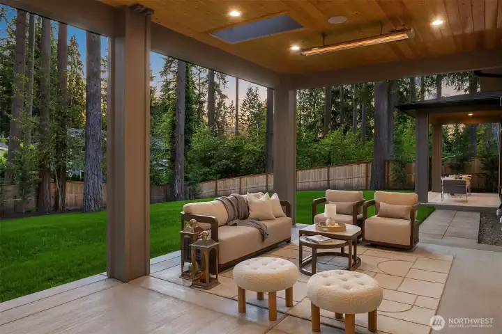 Framed by mature trees and lush greenery, the outdoor spaces enjoy a sense of privacy and natural beauty seldom found in newly built homes.