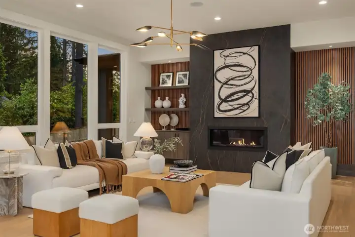 Designed for both everyday living and entertaining, the great room balances warmth, openness, and a seamless connection to the outdoors.