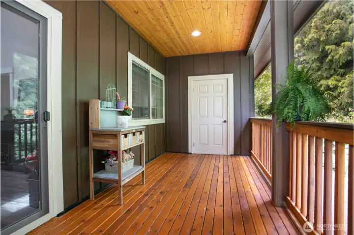 Covered deck with storage closet.