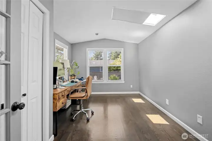 Main level bedroom acting as an office space