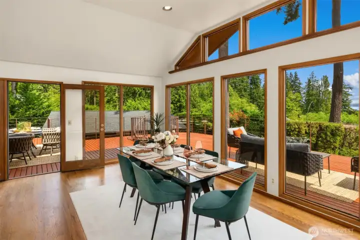 Easy access from the dining room to the deck creates a seamless indoor-outdoor entertaining experience.