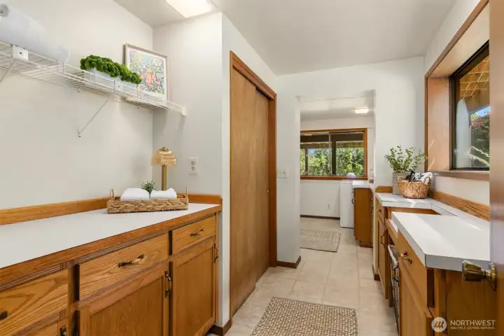 Downstairs office/pantry area attaches to the laundry room.