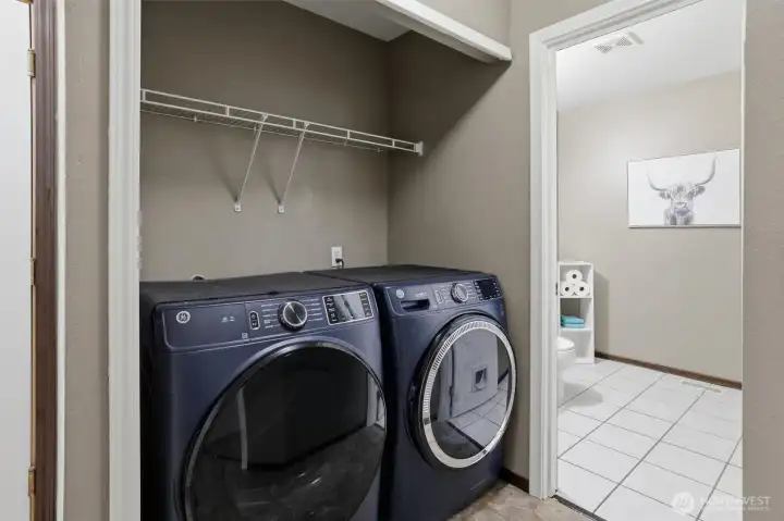 Laundry area next to downstairs bathroom Laundry area next to downstairs bathroom