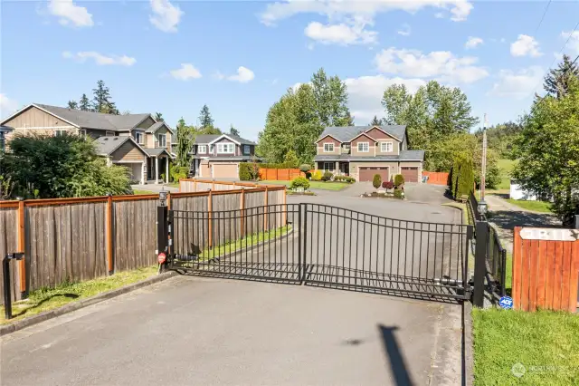 Check out this sweet private gated entry way into this small 4 home development that is minutes to everything in Puyallup and keeps you safe.