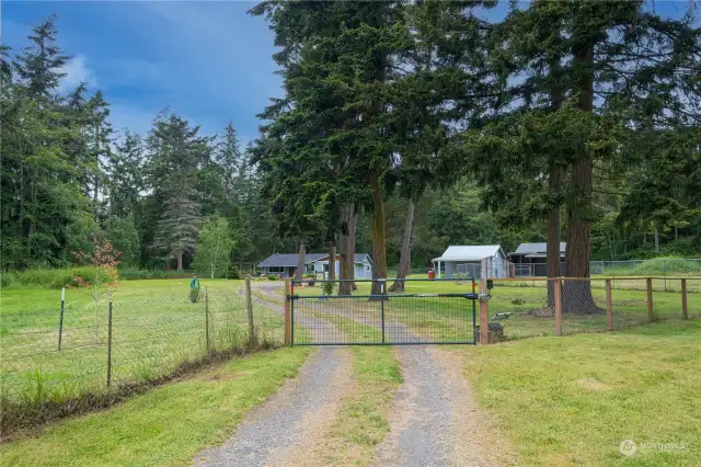just under 5 acres of fully fenced and gated property