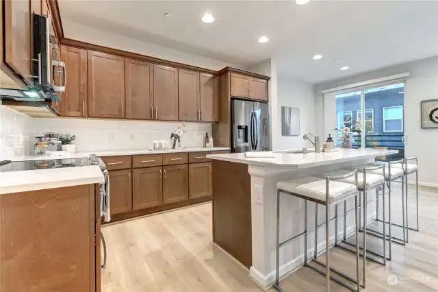 Entertain friends and family in this kitchen with an oversized island and plenty of counter space.