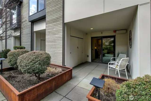 Private outdoor space off lower bedroom connects to courtyard.