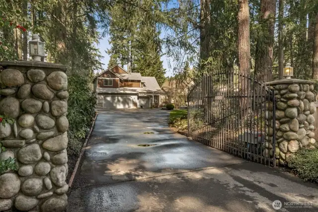 Serene, with Evergreen trees, your new home is peaceful - and gated - for added security.