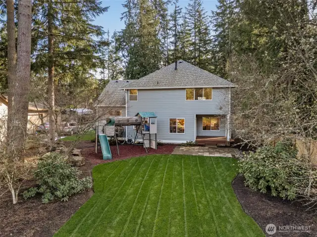 With the house set back from the Creek, there is so much lawn for outdoor play & entertaining!