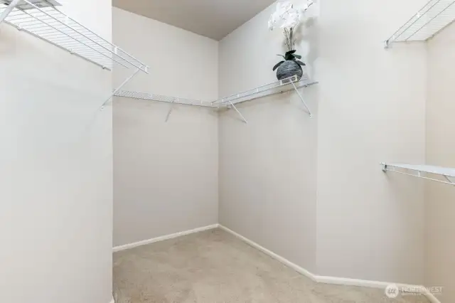 Spacious primary walk-in closet