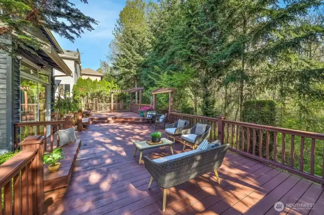 Expansive backyard deck for entertainment! Backs up to private greenbelt.