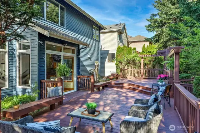 Expansive backyard deck for entertainment! Backs up to private greenbelt.