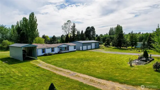 Nothing but upside... 4 bed home, large shop, two RV carports, and ADU