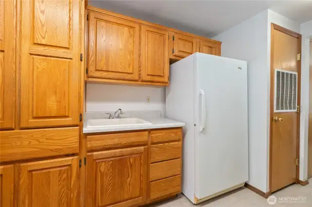 Freezer/ butler pantry/ laundry sink area