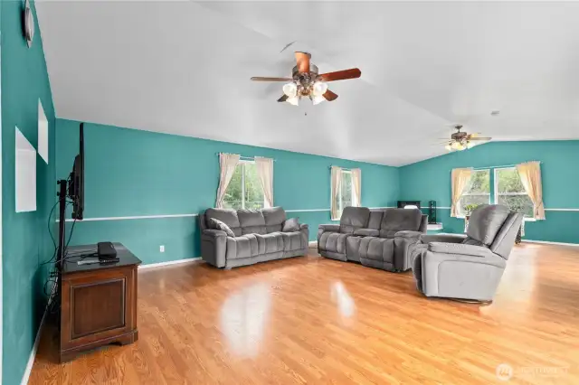 Great family room is bright and has supplementary efficient heat from pellet stove
