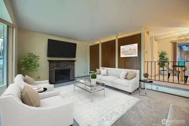 Bring your vision and paint brush to make this space work for you!! Behind paneled wall is the kitchen.  *Photo is virtually staged.