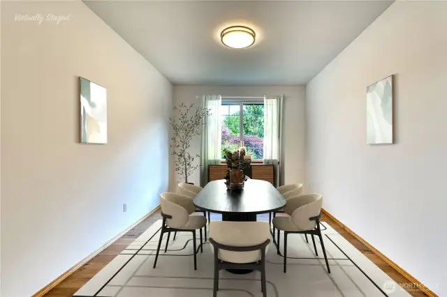 Formal dining room has beautiful engineered hardwood flooring.