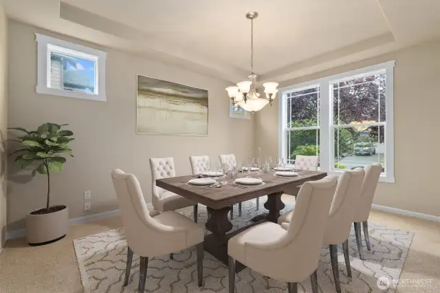 Virtually staged formal dining room.