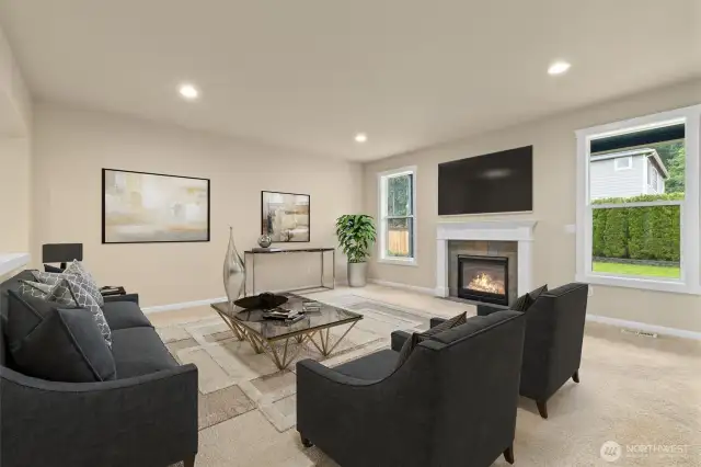 Virtually staged with cozy plenty of natural light for entertaining guests.