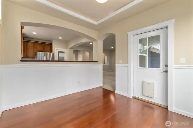 Breakfast nook with entry into backyard patio and deck.