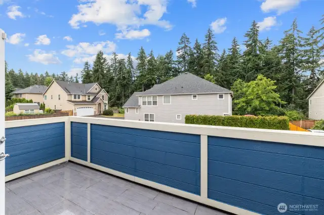 Outdoor balcony space off Primary bedroom.
