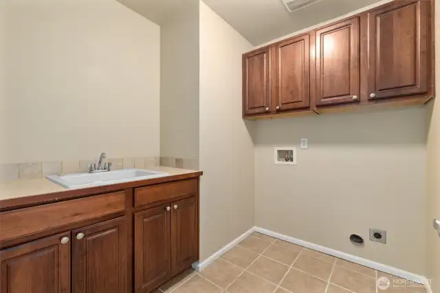 Upstairs laundry room.