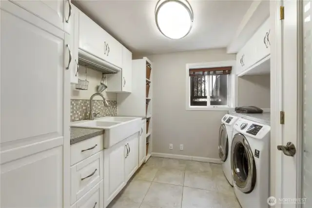 Luxe downstairs laundry room- ample storage