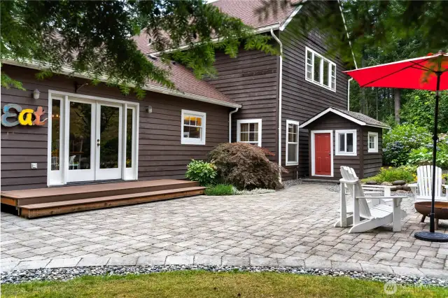 Lovely mature landscaping and a fire pit. Tell your friends to bring the S'mores!